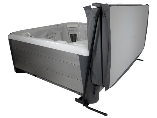 Cover Valet CoverRock-It holding a hot tub cover behind the spa